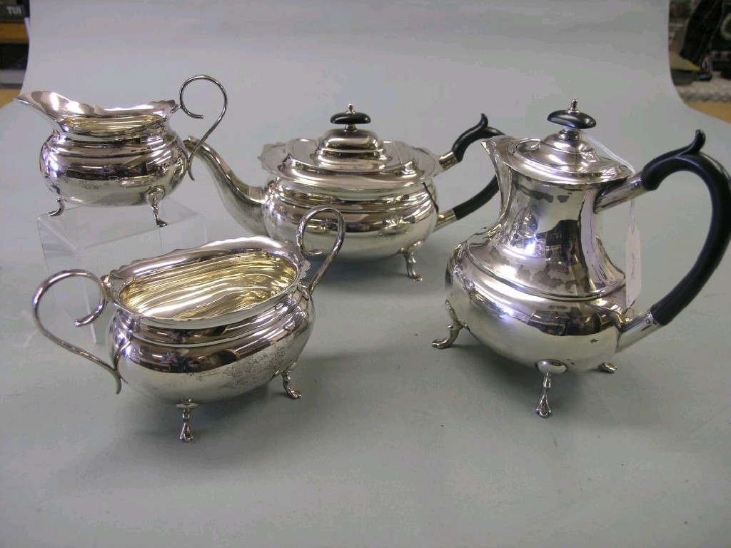 Appraisal: A silver teaset oval shape consisting of teapot two handled