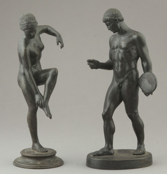 Appraisal: Pair of Figural Bronzes Complementing pair of figural bronzes male