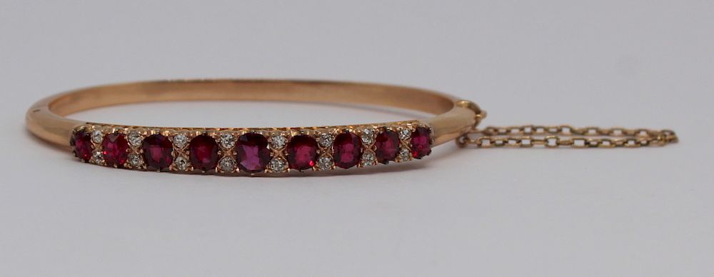 Appraisal: JEWELRY kt Gold Diamond and Garnet Bracelet kt gold bracelet