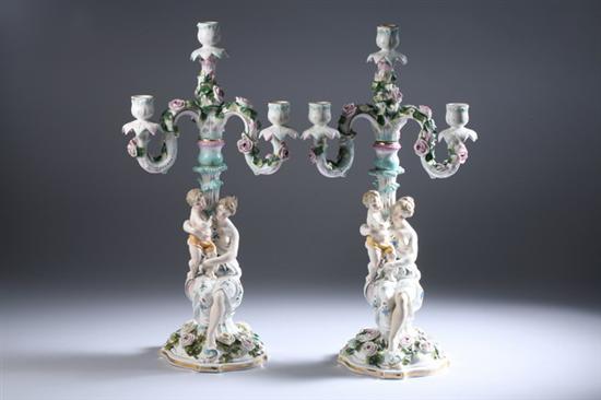 Appraisal: PAIR CONTINENTAL PORCELAIN FIGURAL FOUR-LIGHT CANDELABRAS late th - early