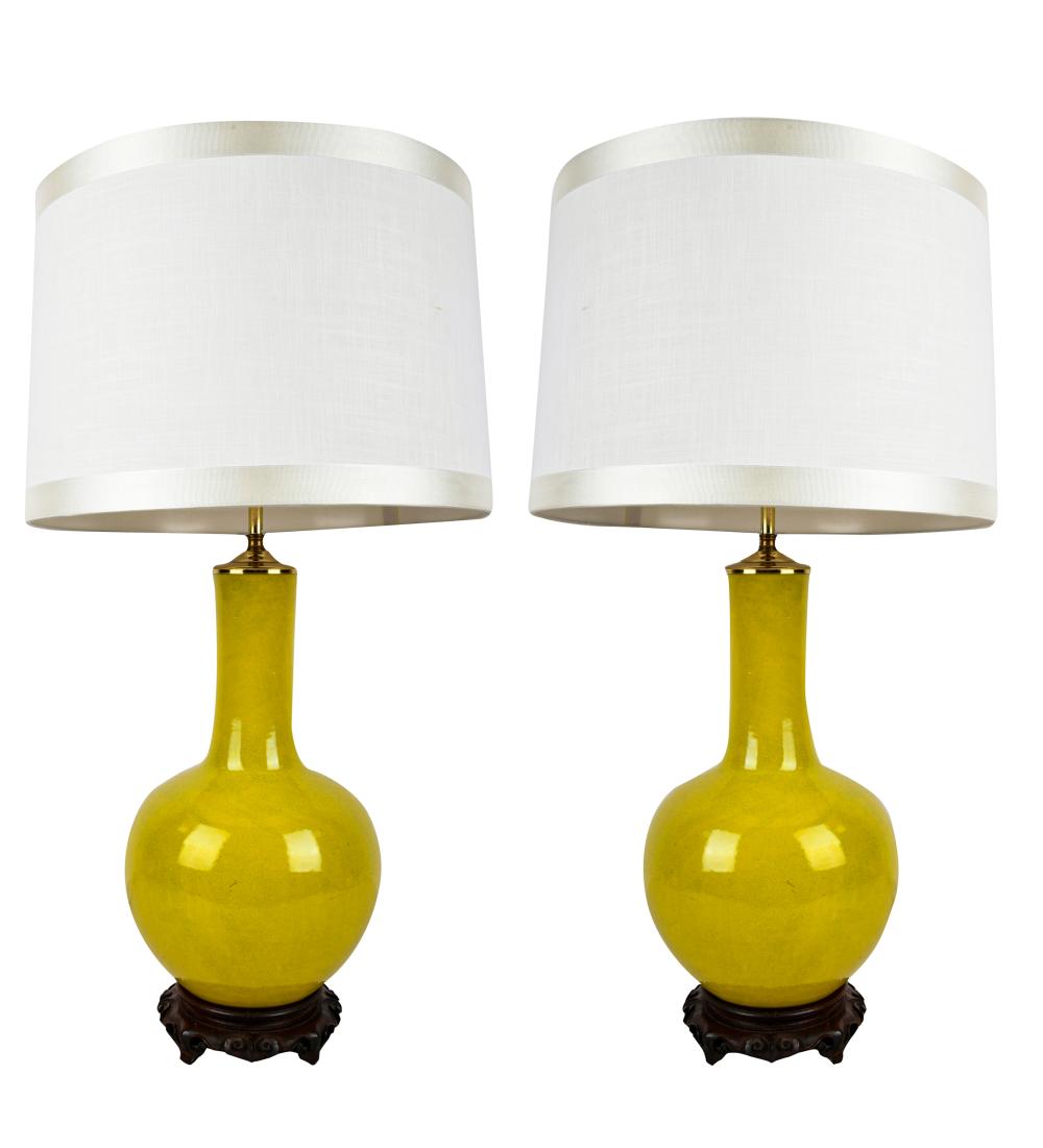 Appraisal: PAIR OF CHINESE YELLOW-GLAZED PORCELAIN VASESmounted as lamps on wooden