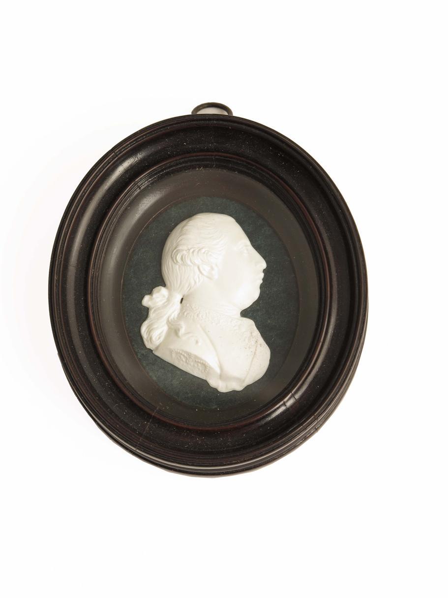 Appraisal: A composition glass paste portrait bust of George III attributed