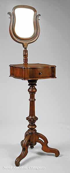 Appraisal: An American Renaissance Walnut Shaving Stand mid- th c with