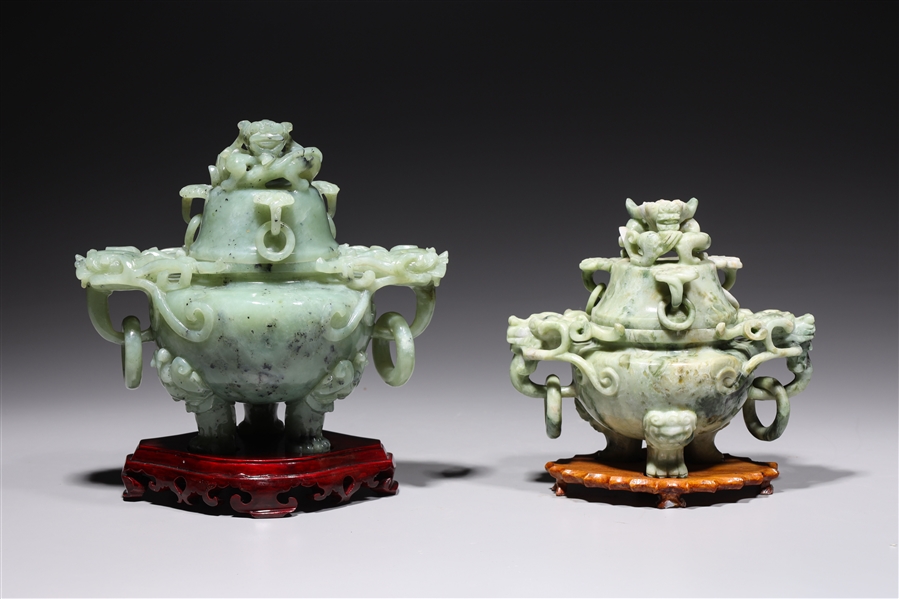 Appraisal: Two Chinese carved hardstone vessels each with animal handles finial