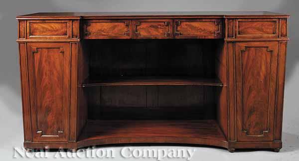 Appraisal: An Antique Regency-Style Mahogany Sideboard th c the breakfronted and