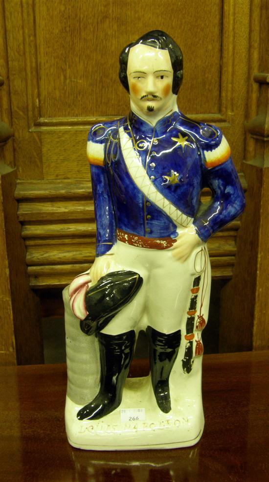 Appraisal: A VICTORIAN STAFFORDSHIRE POTTERY FIGURE of Louis Napoleon - in