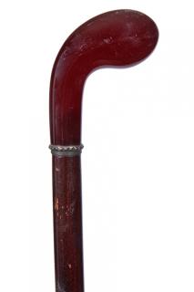 Appraisal: Bakelite Dress Cane Ca A beautiful cherry amber Bakelite handle