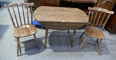 Appraisal: Drop leaf table with matching spindle back chairs