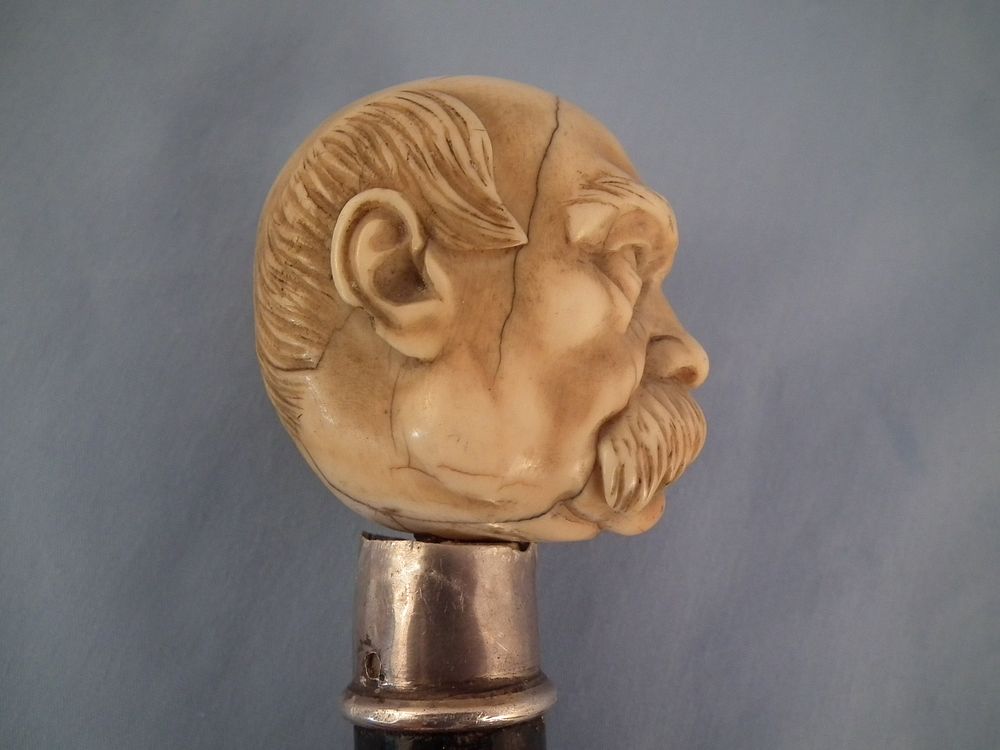 Appraisal: ANTIQUE GROVER CLEVELAND CANE th century carved bone cane with