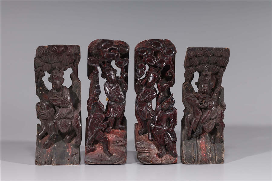 Appraisal: Group of four antique circa Chinese lacquered wood figural carvings