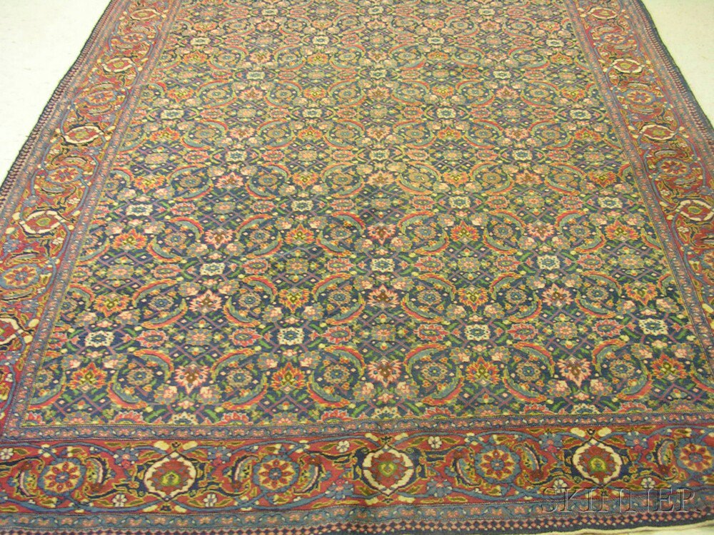 Appraisal: Persian Carpet early th century the navy field with overall