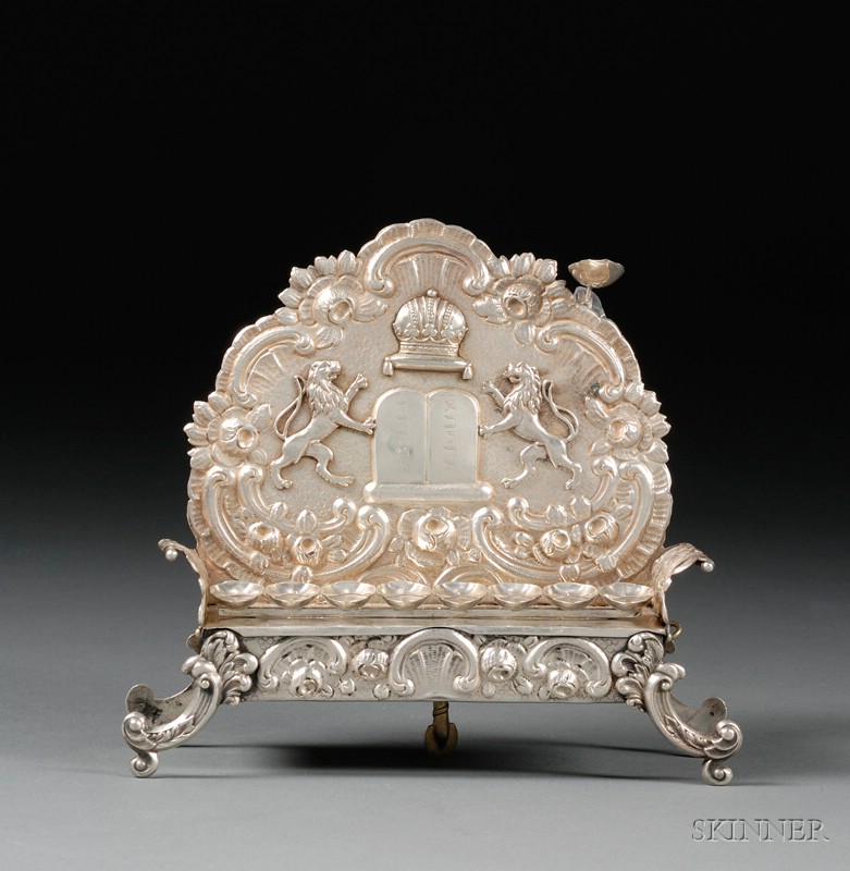 Appraisal: Austrian Silver Music-Box Hanukkah Lamp arched backplate decorated in repousse