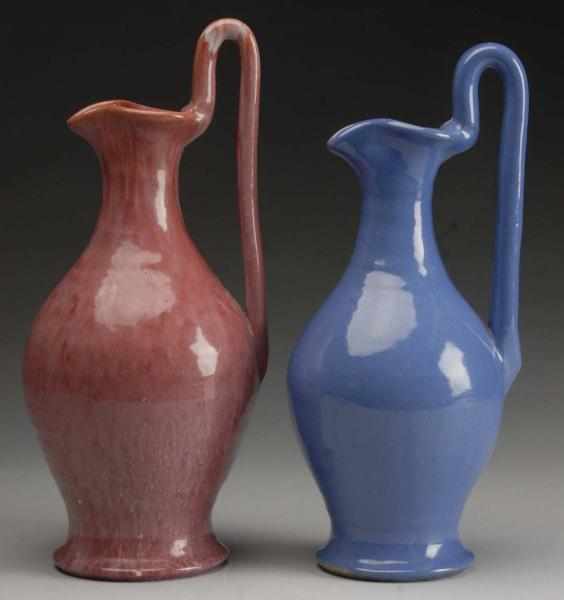 Appraisal: Pair of Carolina Pottery Rebecca Handled Ewers Description Beautiful strawberry