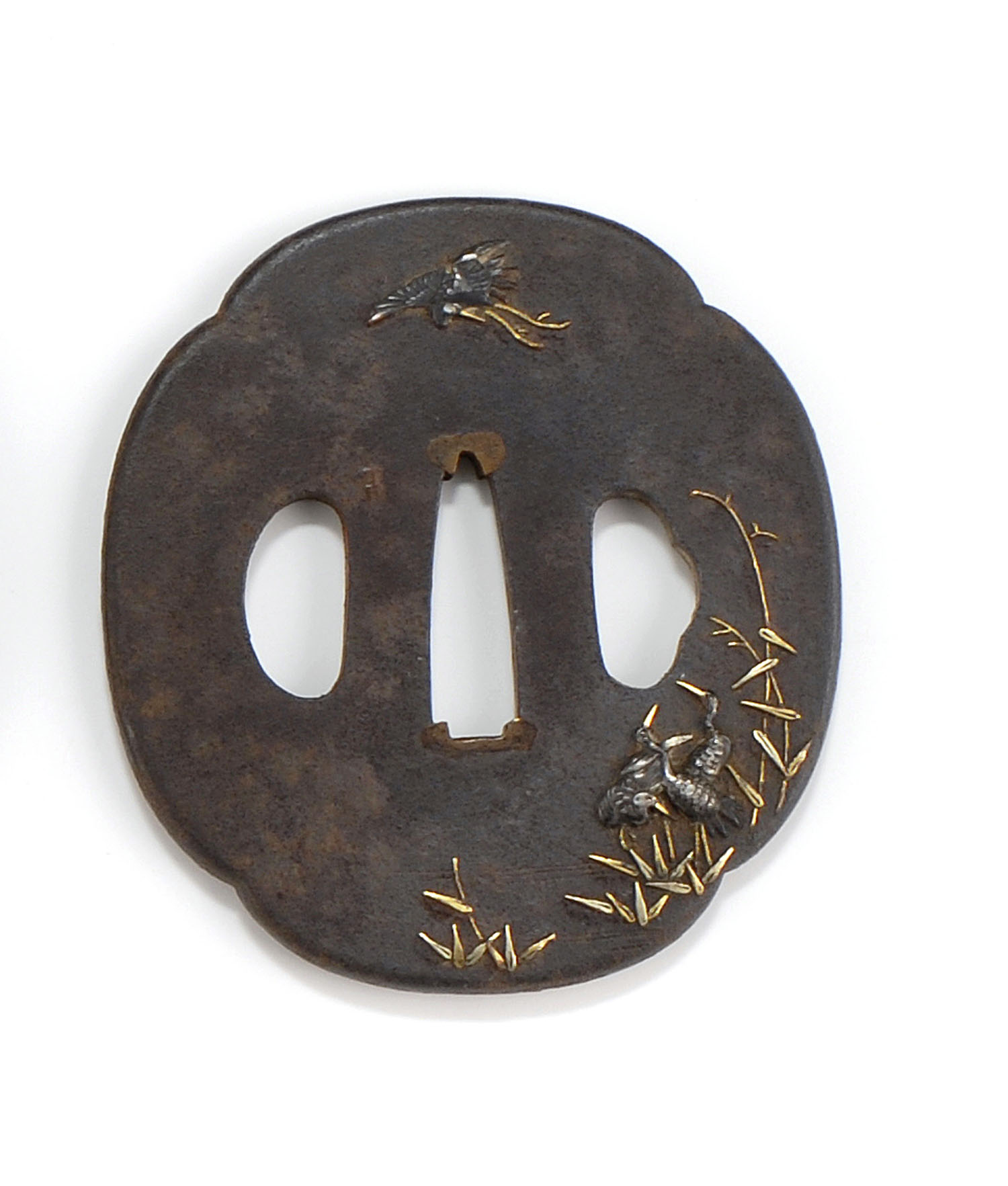 Appraisal: MOKKO-FORM IRON TSUBA Circa With gold and silver inlay of