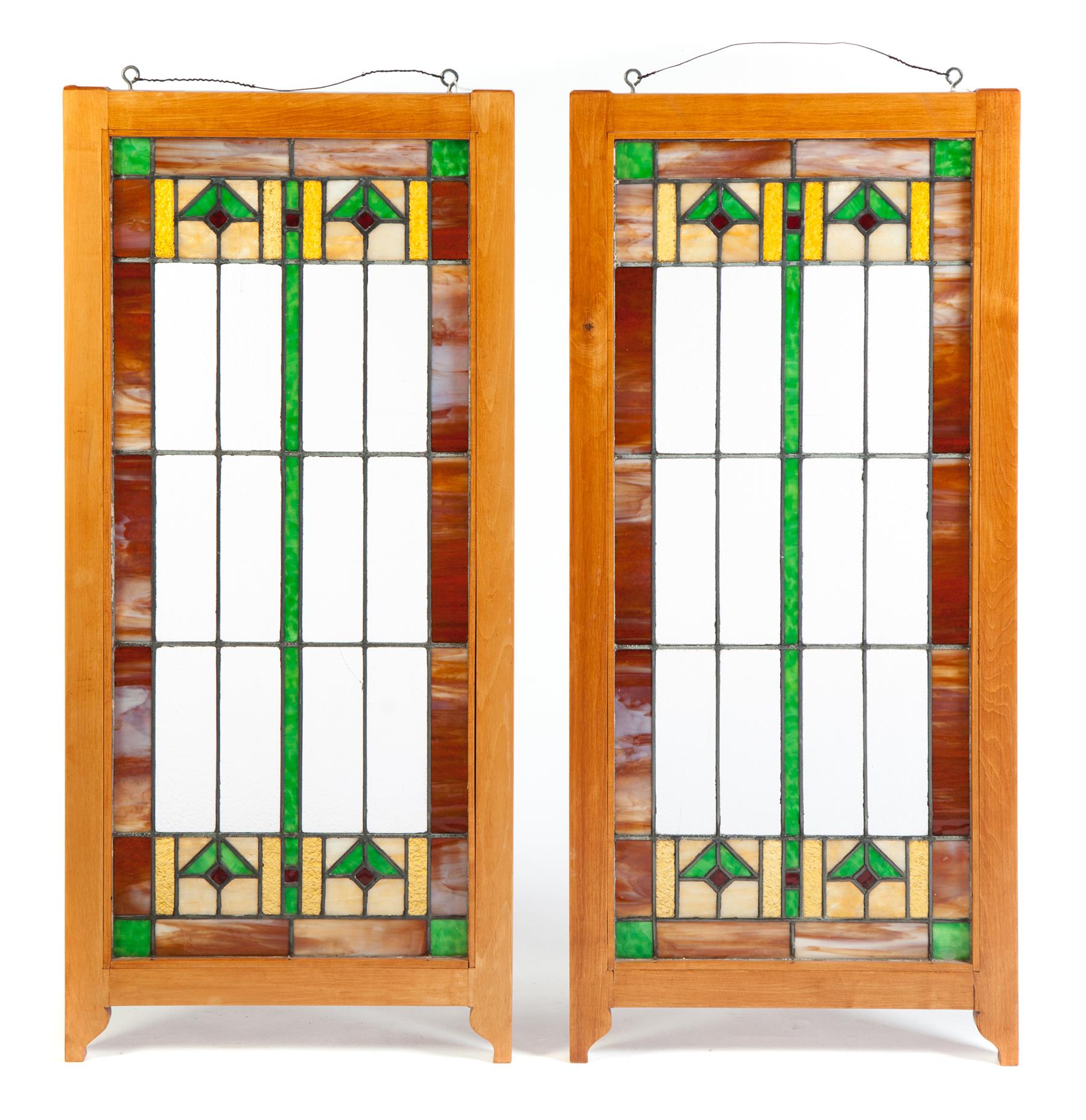 Appraisal: PAIR OF LEADED COLORED GLASS WINDOWS American st quarter- th