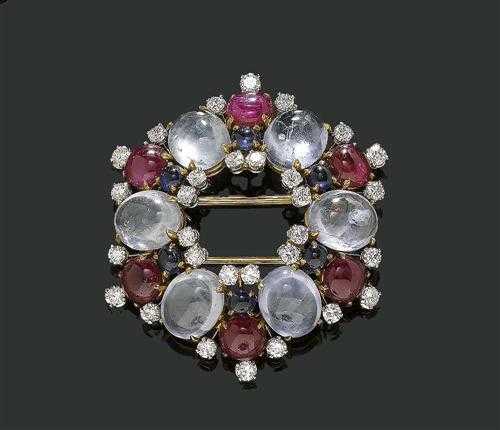 Appraisal: GEMSTONE AND DIAMOND CLIP BROOCH ca Yellow and white gold