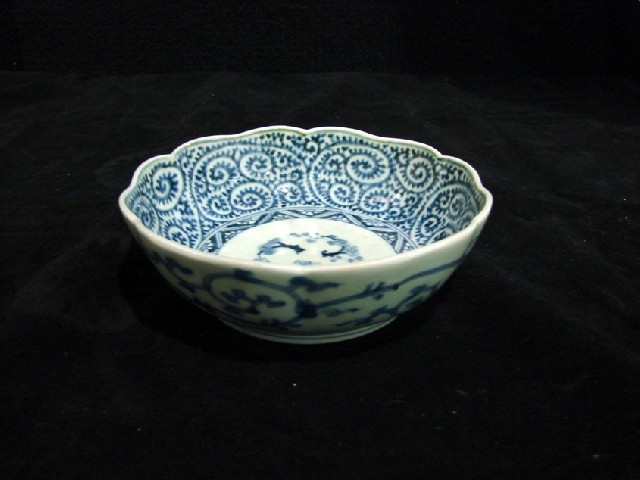 Appraisal: A Chinese blue and white lobed bowl centrally painted with