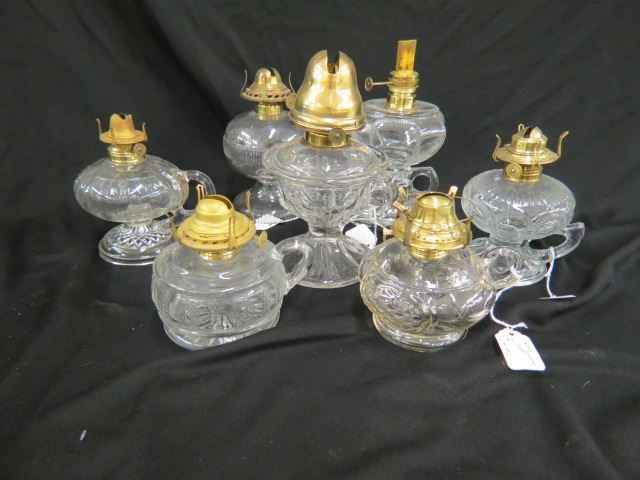 Appraisal: Collection of Antique Oil Lamps chamberstick style all with burners