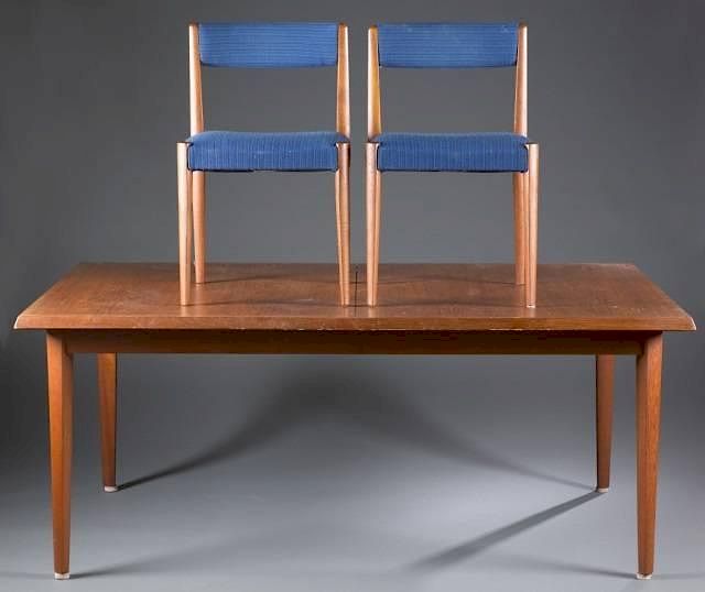 Appraisal: Danish teak dining table Fritz Hansen chairs A Danish teak