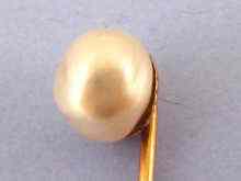 Appraisal: A certificated natural pearl stick pin the Gem and Pearl