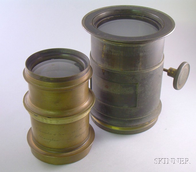 Appraisal: Two Brass-bound Lenses an unsigned lens with rack-and-pinion focusing aperture