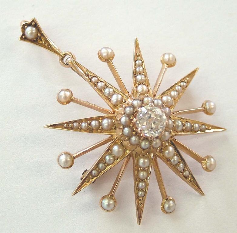 Appraisal: ct diamond and seed pearl star brooch centre stone ct