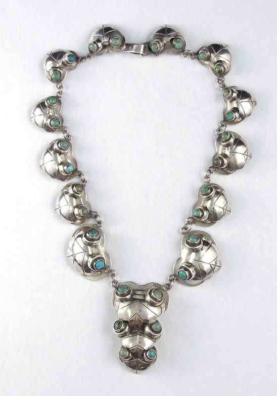 Appraisal: MEXICAN SILVER NECKLACE WITH TURQUOISE CABOCHONS Bud and foliate motif