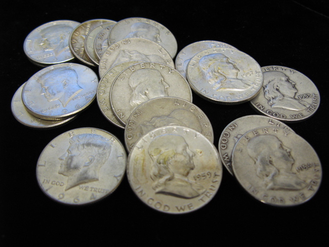 Appraisal: A ROLL OF TWENTY U S SILVER HALF DOLLARS including