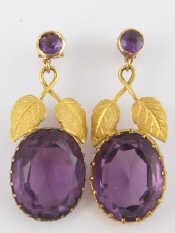 Appraisal: A pair of faux amethyst earrings drop approx cm