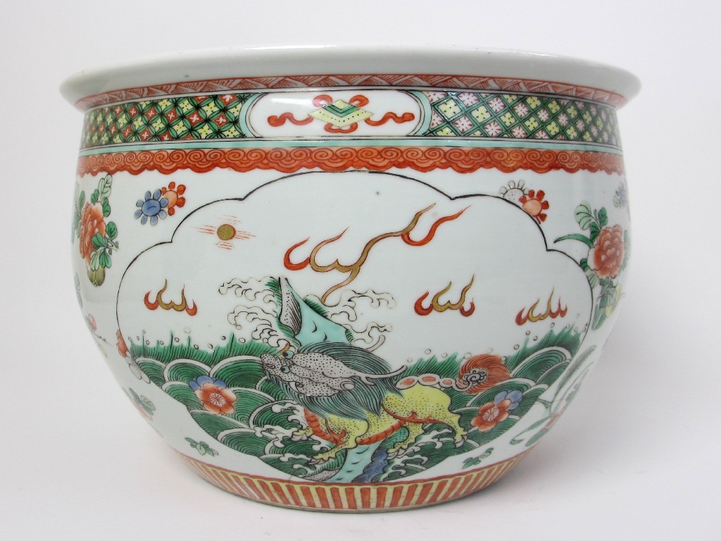 Appraisal: A Chinese famille verte jardiniere decorated with panels of qilin