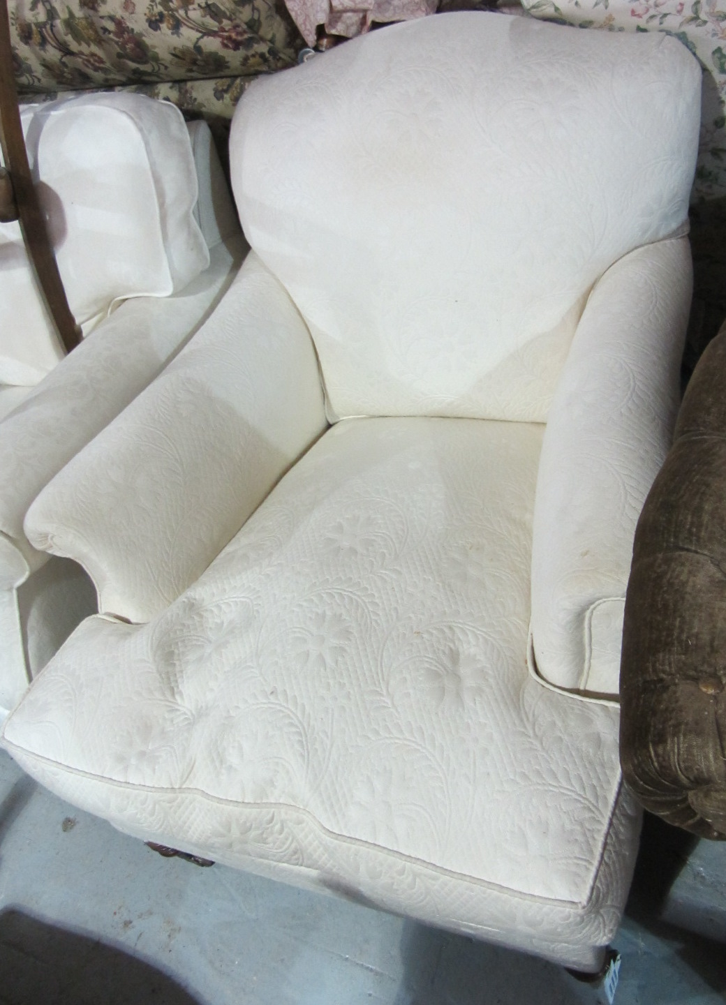 Appraisal: A th century white upholstered armchair