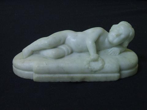 Appraisal: MARBLE FIGURE OF SLEEPING CHILD Scantily draped and holding a