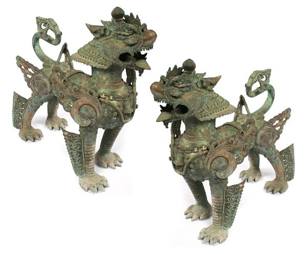 Appraisal: A pair of Himalayan patinated metal lion dogs length in