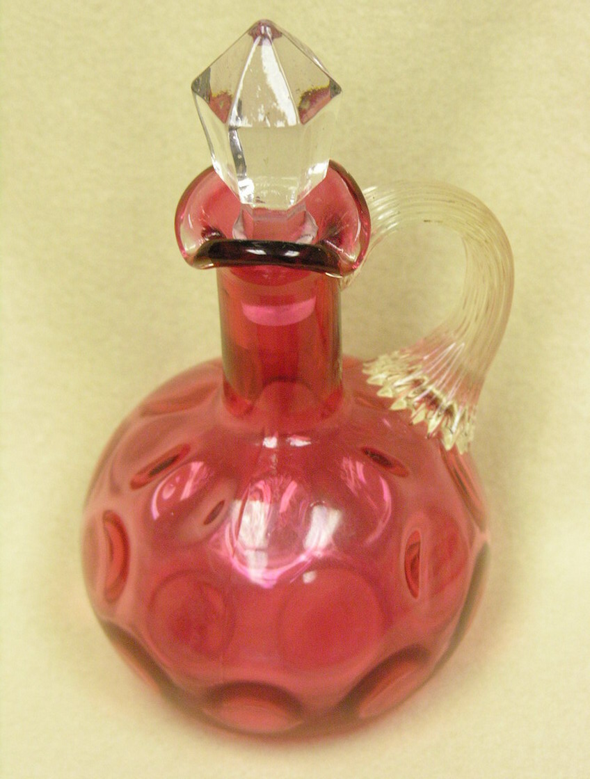 Appraisal: CRANBERRY INVERTED THUMBPRINT CRUET Applied Clear Handle Size to stopper