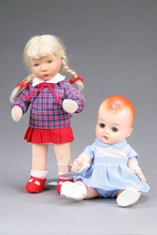 Appraisal: TWO DOLLS A hard plastic bent leg baby with sleep