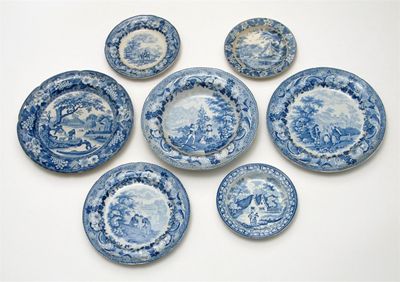 Appraisal: Seven plates or dishes printed in blue with rustic figures