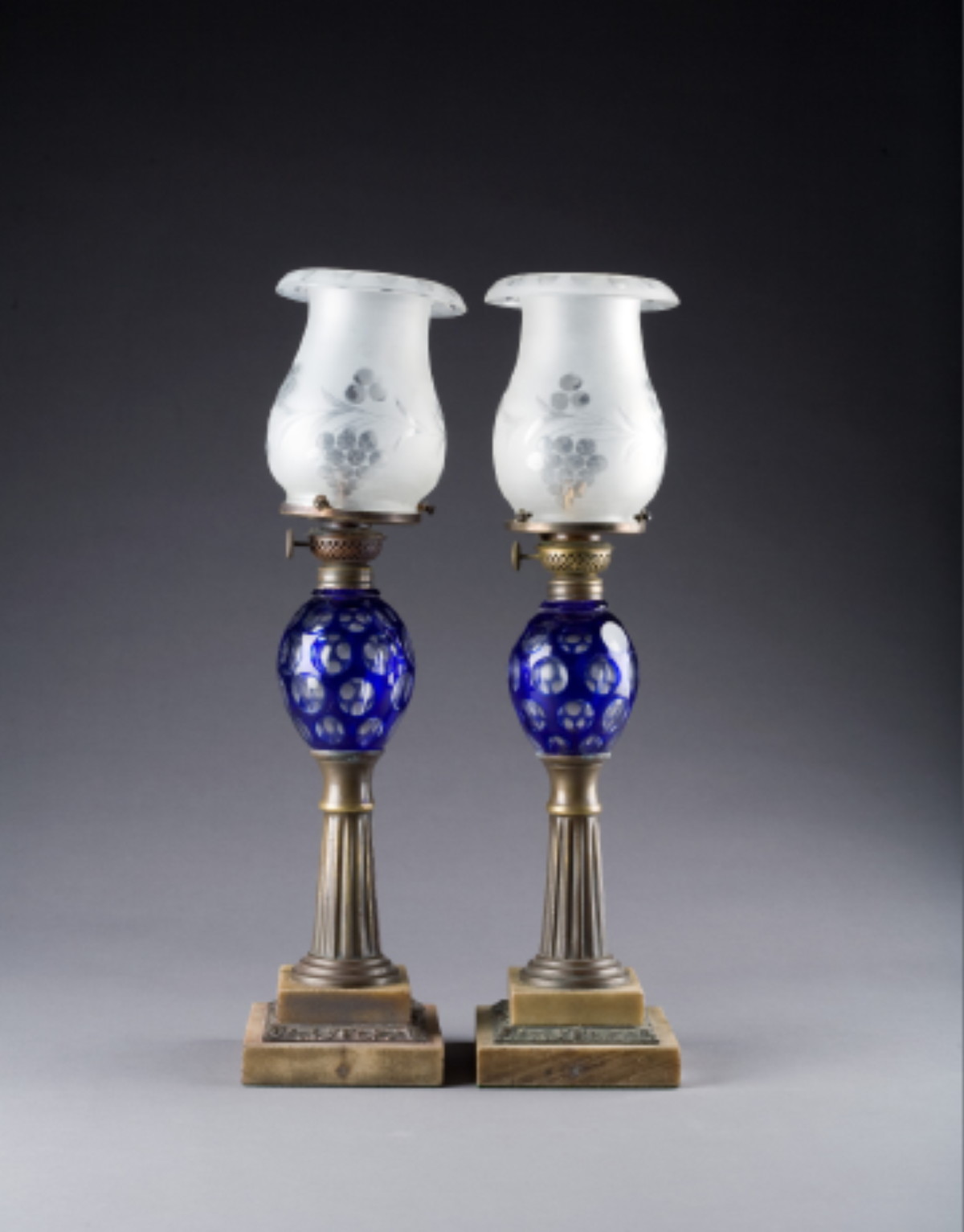 Appraisal: PAIR OF AMERICAN COBALT-BLUE CUT SINGLE OVERLAY PUNTY LAMPS WITH