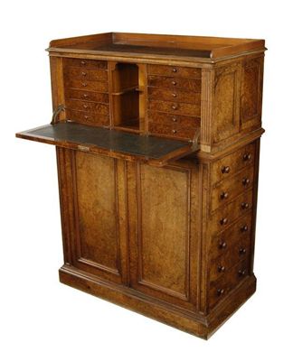 Appraisal: A Victorian burr walnut cabinet the moulded edge top inset