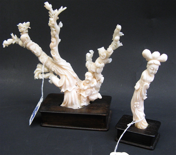 Appraisal: TWO SEA CORAL HAND CARVED PIECES the first a flowering