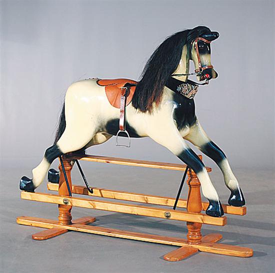 Appraisal: Child's rocking horse on wood frame and runners H W