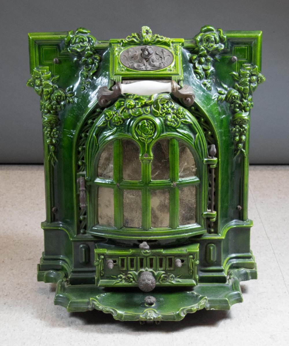 Appraisal: GREEN ENAMELED CAST IRON HEATING STOVE French late th early