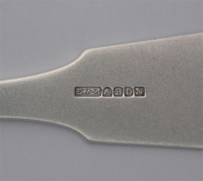 Appraisal: EMSLIE MOLLISON A fiddle thread and shell single struck tablespoon