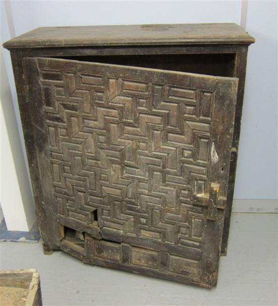 Appraisal: th century Eastern hardwood carved cabinet with a single door