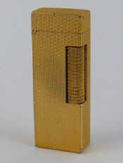 Appraisal: A Dunhill gold plated cigarette lighter approx cm high