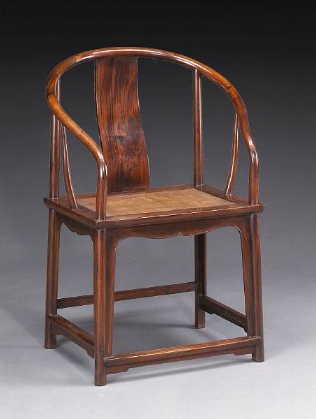 Appraisal: A mixed hardwood horseshoe armchair Late Qing Republic Period Built