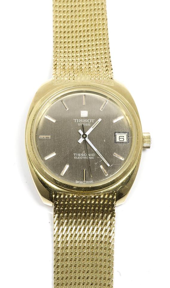 Appraisal: GENTLEMAN'S WRISTWATCH TISSOT s Yellow gold g Tonneau-shaped case with