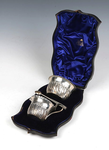 Appraisal: A SILVER CHRISTENING SET consisting of a cream jug sugar