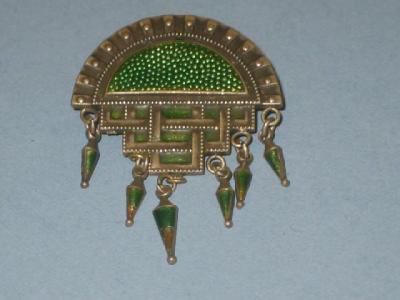 Appraisal: A SILVER AND ENAMEL ART DECO BROOCH the arched top