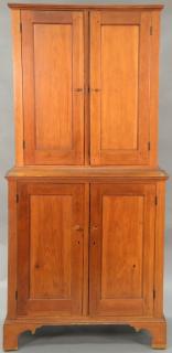 Appraisal: Primitive stepback cupboard in two parts with two doors in