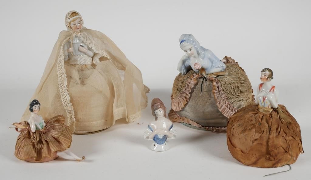 Appraisal: GROUP OF FIVE PIN CUSHION DOLLS Early th C porcelain